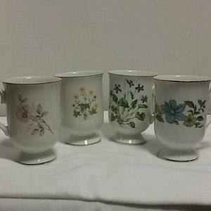 Set of 4 collectible  genuine porcelain china mugs